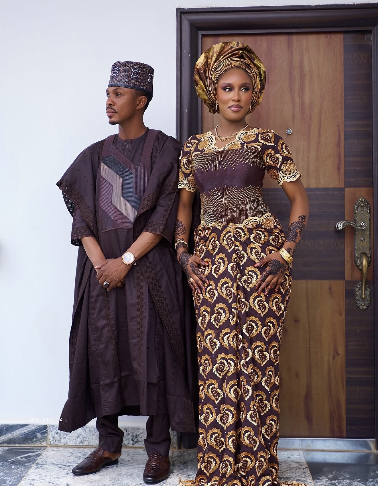 Couple in coordinated patterned traditional attire